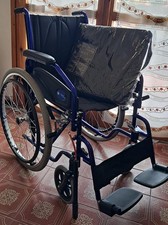 AIESI Sedia a Rotelle